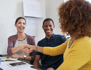 Business owner renewing contract with her client